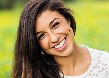 Woman smiling outdoors