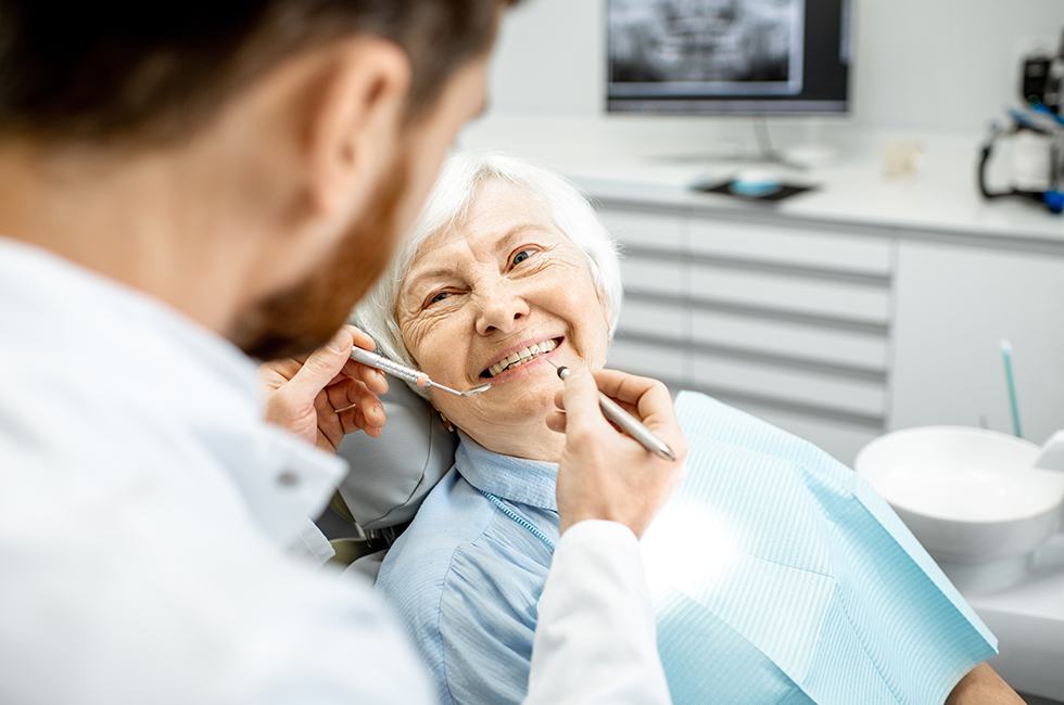 Older woman receiving dental treatment