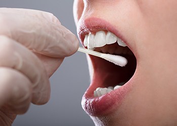Closeup of patient during oral DNA testing