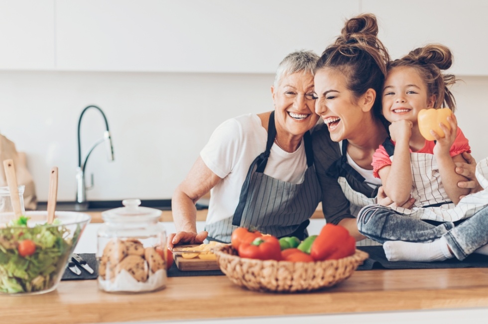 Mother daugther and granddaughter laughing together