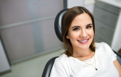 Smiling woman in dental chair