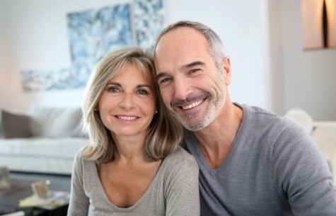 Happy man and woman smiling together