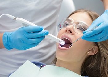 Dentist capturing intraoral images