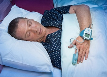 Man taking an at-home sleep test