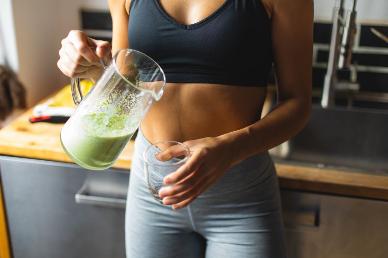 woman drinking juice