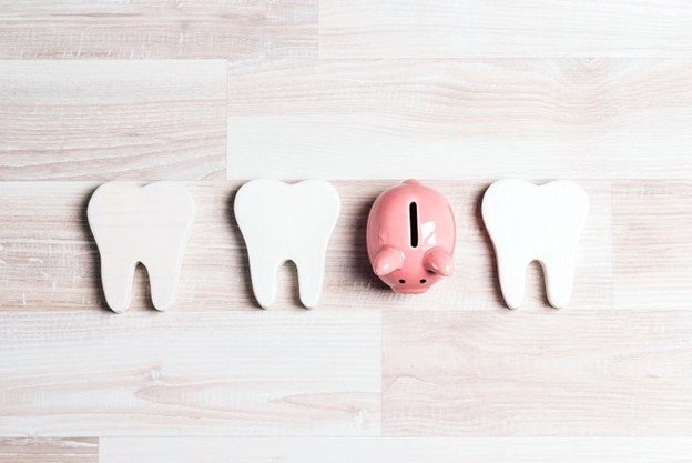teeth with piggy bank