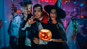 a family smiling during Halloween in Midland