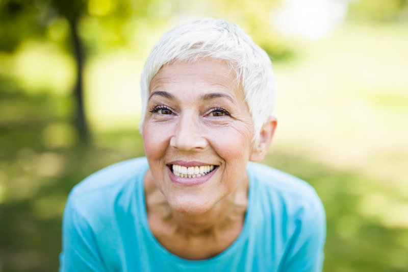 Senior smiling toward the camera