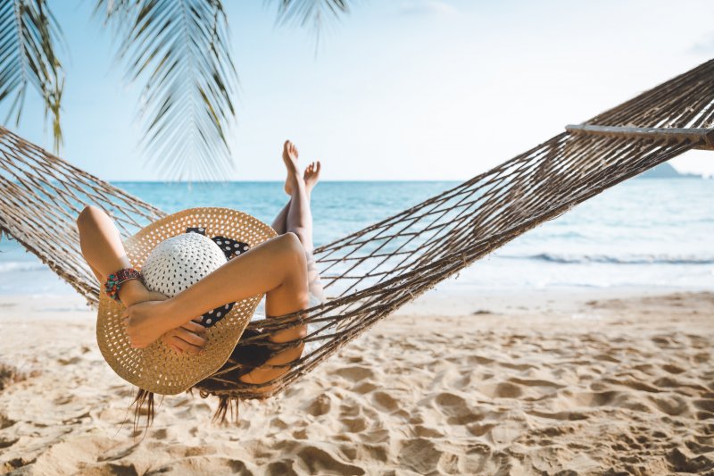 A woman relaxing on the beach